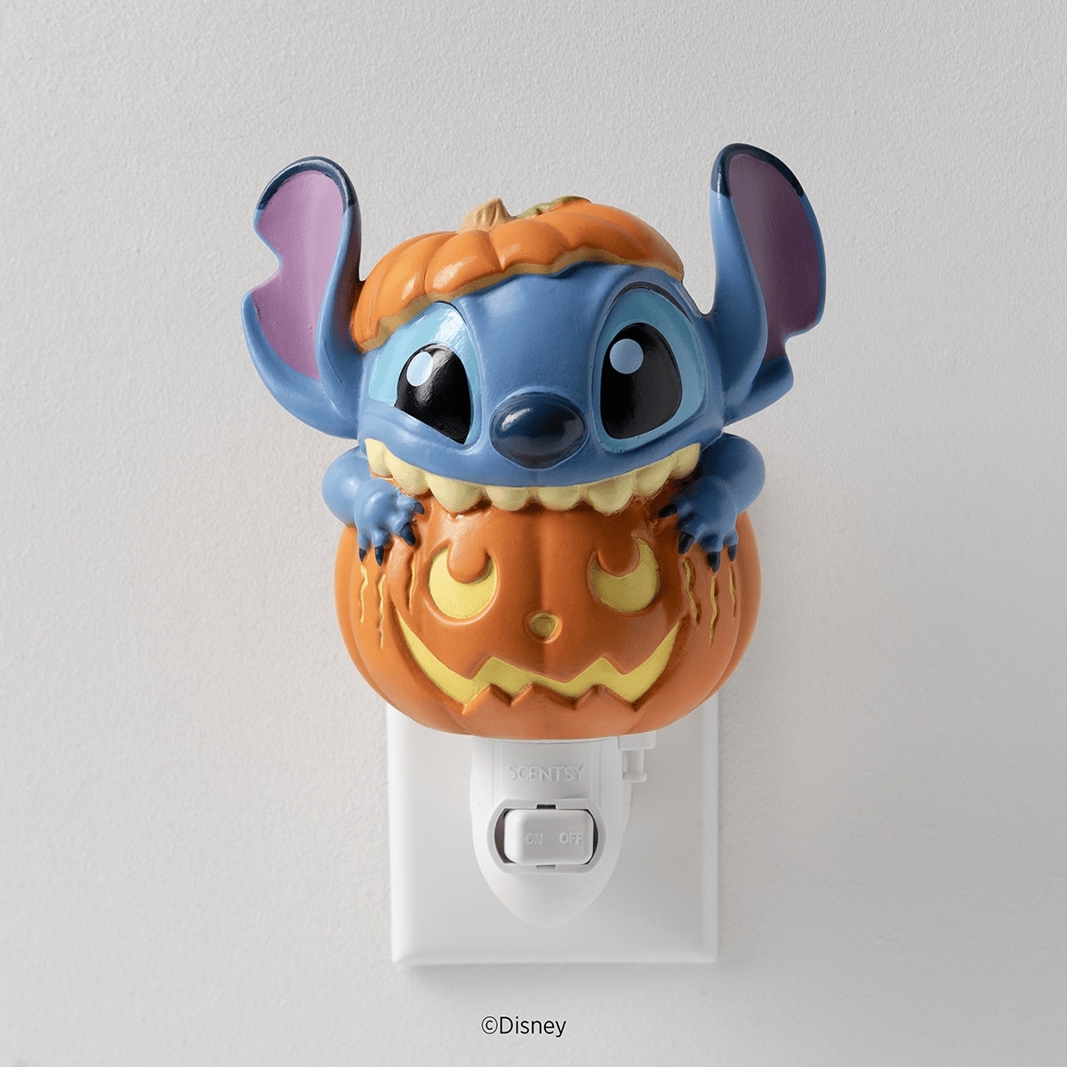 Disney Stitch Pumpkin Trouble – Scentsy Mini Warmer with Wall Plug Switched Off Disney Stitch Pumpkin Trouble – Scentsy Mini Warmer with Wall Plug Switched Off